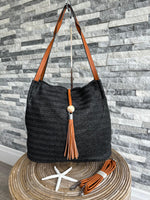 Load image into Gallery viewer, luscious scarves Black and Tan Woven Shoulder Bag with Tassel and Bead .
