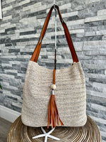 Load image into Gallery viewer, luscious scarves Handbags Cream and Tan Woven Shoulder Bag with Tassel and Bead .
