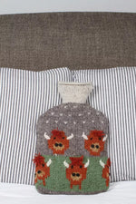 Load image into Gallery viewer, luscious scarves hotwater Pachamama Herd Of Highland Cow Hot Water Bottle, Hand Knitted
