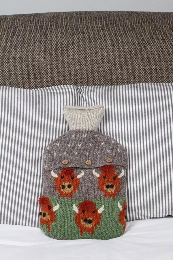 luscious scarves hotwater Pachamama Herd Of Highland Cow Hot Water Bottle, Hand Knitted