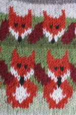 Load image into Gallery viewer, luscious scarves hotwater Pachamama Skulk of Foxes Hot Water Bottle , Hand Knitted , Fairtrade

