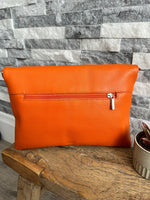 Load image into Gallery viewer, luscious scarves Orange Fold Over Italian Leather Clutch Bag

