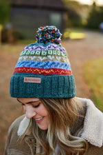Load image into Gallery viewer, luscious scarves wool hat Pachamama Elveden Roll Back Bobble Beanie , Handknitted , Fairtrade
