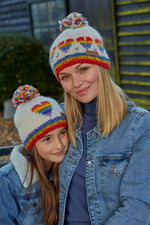 Load image into Gallery viewer, luscious scarves wool hat Pachamama Kids Rainbow Heart Bobble Beanie, Fairtrade , Handmade
