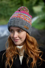 Load image into Gallery viewer, luscious scarves wool hat Pachamama Pink Iona Rollback Bobble Beanie , Handknitted , Fairtrade
