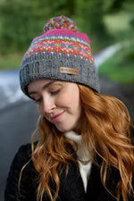 Load image into Gallery viewer, luscious scarves wool hat Pachamama Pink Iona Rollback Bobble Beanie , Handknitted , Fairtrade
