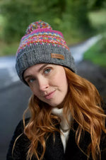 Load image into Gallery viewer, luscious scarves wool hat Pachamama Pink Iona Rollback Bobble Beanie , Handknitted , Fairtrade
