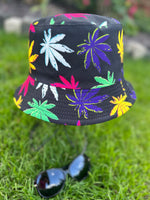 Load image into Gallery viewer, lusciousscarves Black Reversible Bucket Hat with Bright Coloured Hemp Leaf Design
