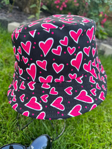lusciousscarves Black Reversible Bucket Hat with Pink Hearts Design