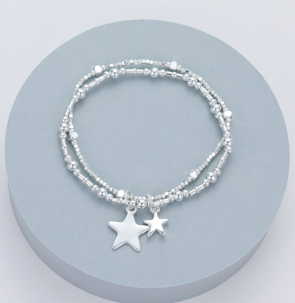 lusciousscarves Gracee Silver Double Strand Stretchy Bracelet with 2 Star Charms .