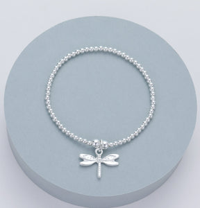 lusciousscarves Gracee Stretchy Silver Bracelet with a Small Dragonfly Charm.