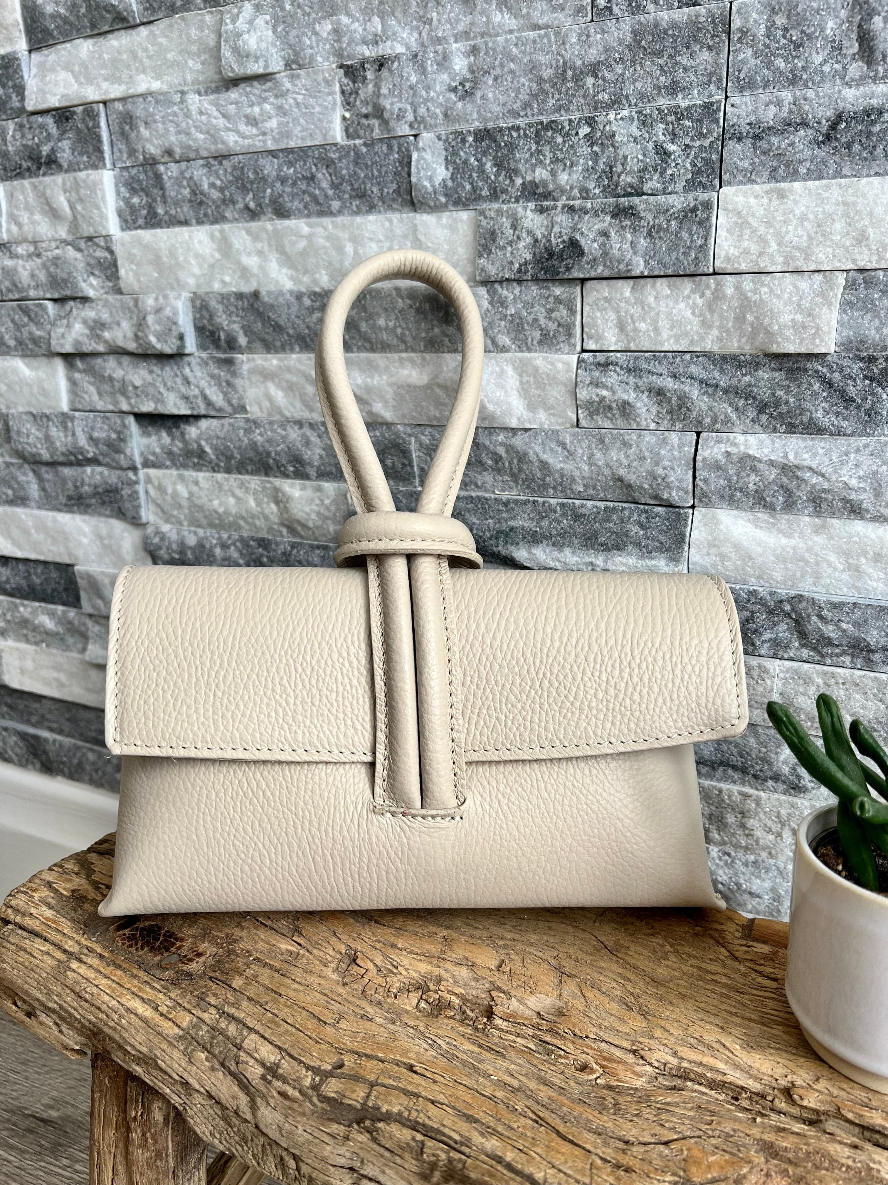 Cream handbags sales