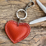 Load image into Gallery viewer, lusciousscarves Handbags Orange Small Leather Heart Padded Keyring.
