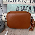 Load image into Gallery viewer, lusciousscarves Handbags Tan Leather tassel camera style crossbody bag.

