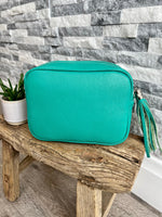 Load image into Gallery viewer, lusciousscarves Handbags Turquoise Green Leather tassel camera style crossbody bag , Summer Colours
