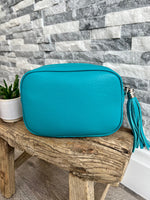 Load image into Gallery viewer, lusciousscarves Handbags Turquoise Leather tassel camera style crossbody bag , Summer Colours
