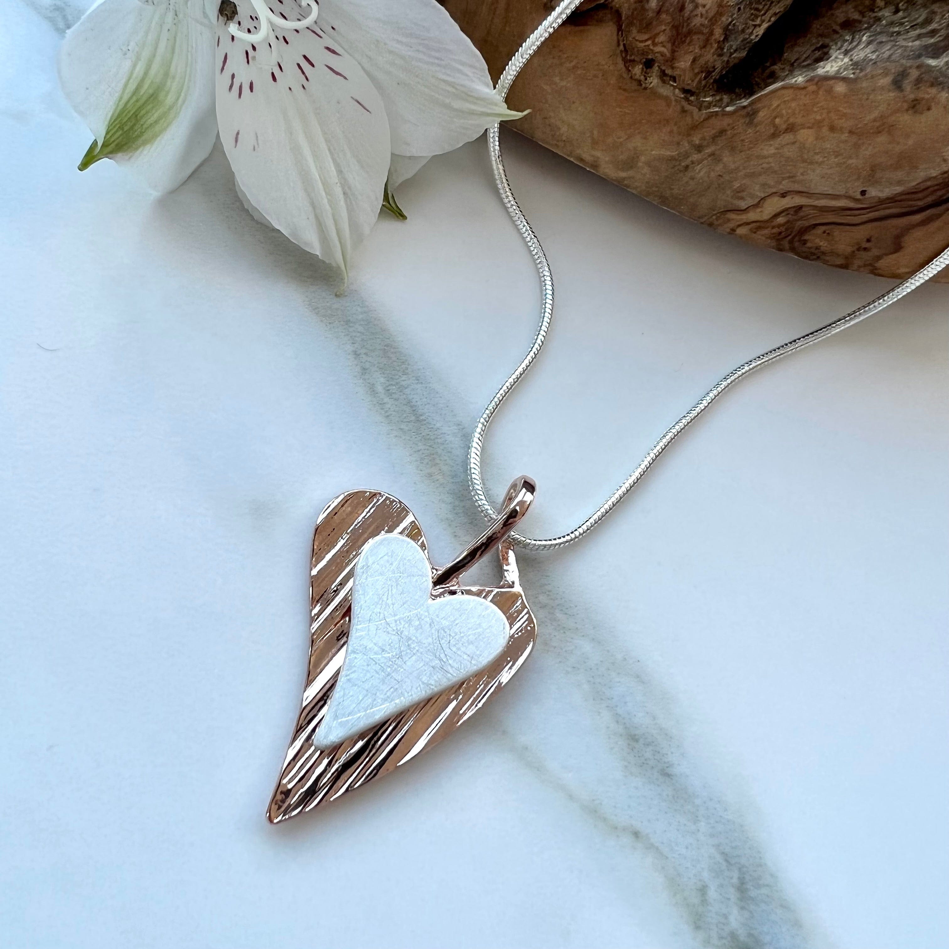 Silver and rose gold double hearts necklace. luscious scarves