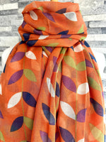 Load image into Gallery viewer, lusciousscarves Red Cuckoo Orange Scarf with White, Navy and Green Leaves
