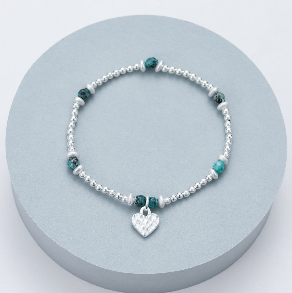 lusciousscarves Stretchy Silver Bracelet with Turquoise Stones and a Small Matt Silver Heart Charm