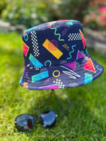 Load image into Gallery viewer, lusciousscarves sun hats Navy Reversible Bucket Hat with Squiggles and Shapes Design
