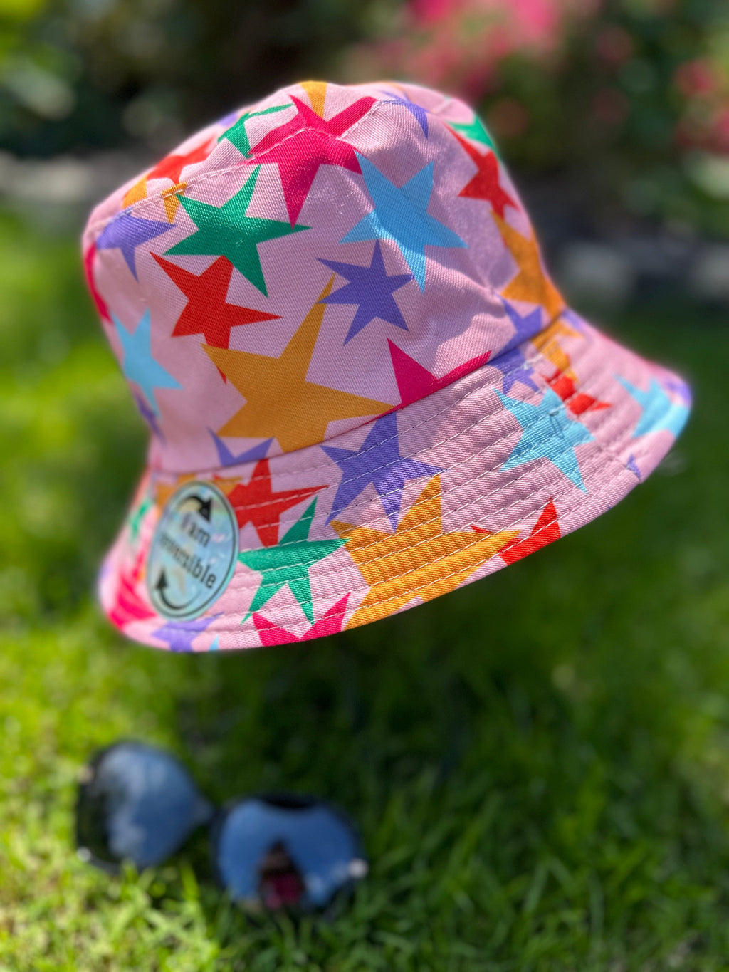 lusciousscarves sun hats Pink Bucket Hat with Multi Coloured Stars Design Reversible