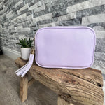 Load image into Gallery viewer, lusciousscarves Handbags Lilac Vegan Faux leather tassel camera style crossbody bag
